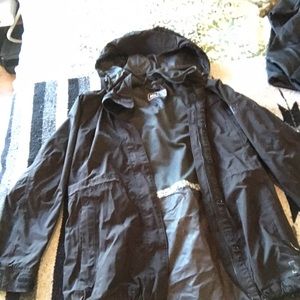 Black women’s REI water proof shell